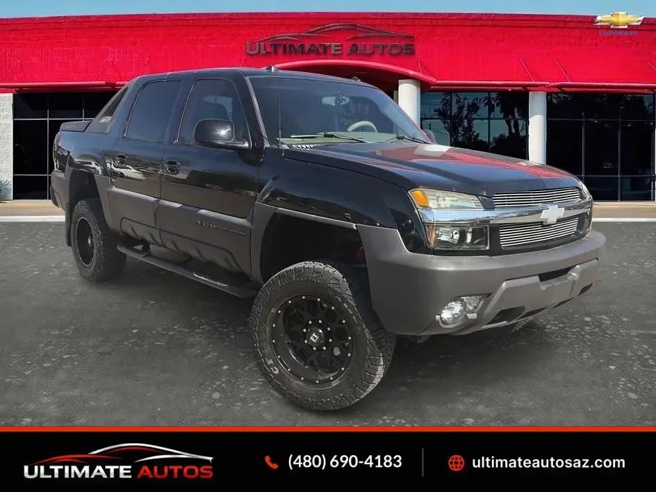 Black 2004 Chevrolet Avalanche Pickup Truck Four-Wheel Drive Automatic