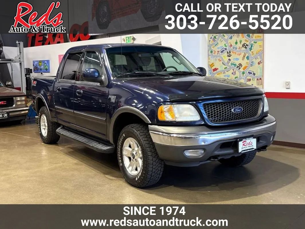 Blue 2002 Ford F-150 Pickup Truck Four-Wheel Drive 4-Speed Automatic